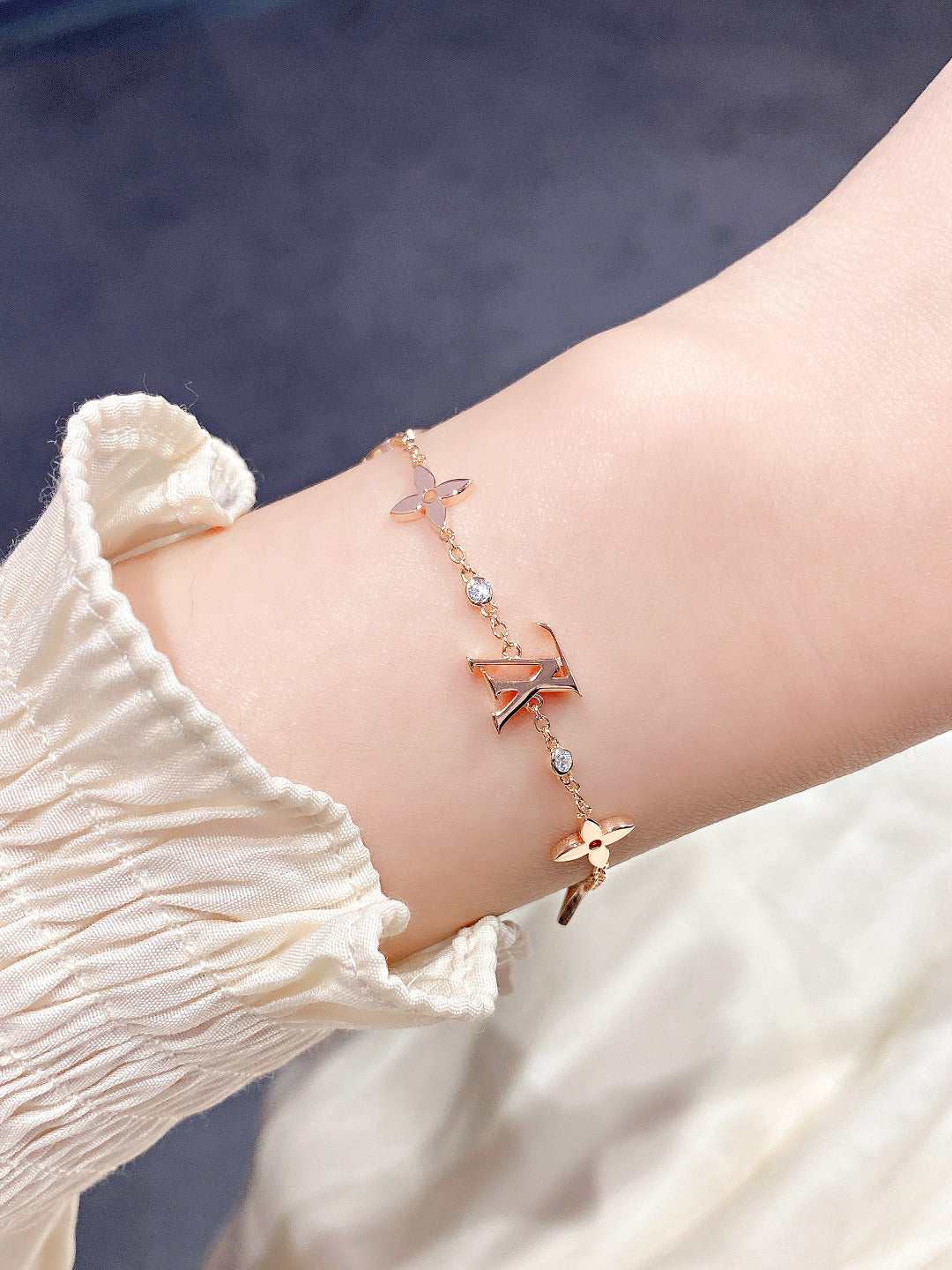 ¡®Aura Jewels¡¯STAR AND SUN 7 MOTIFS GOLD BRACELET