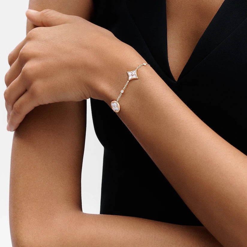 ¡®Aura Jewels¡¯STAR AND SUN 4 MOTIF WHITE MOP PINK GOLD BRACELET